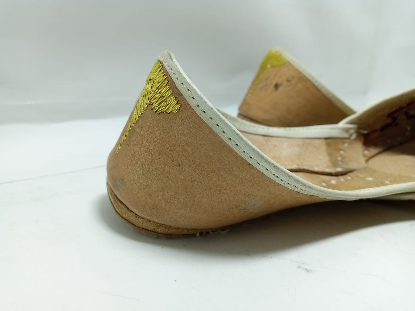 Jeniius "Golden jutti" Embroidered Khussa | Handcrafted Elegance with Gold, Red & Black Accents