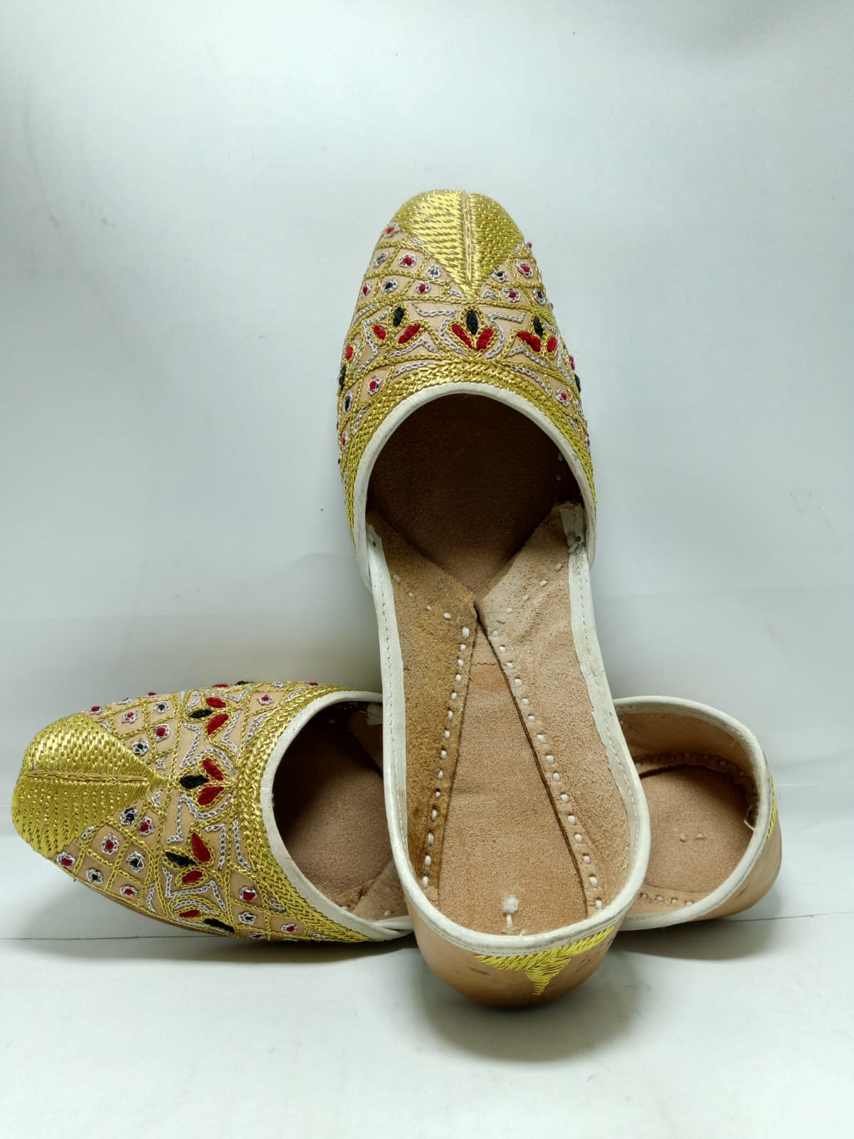 Jeniius "Golden jutti" Embroidered Khussa | Handcrafted Elegance with Gold, Red & Black Accents
