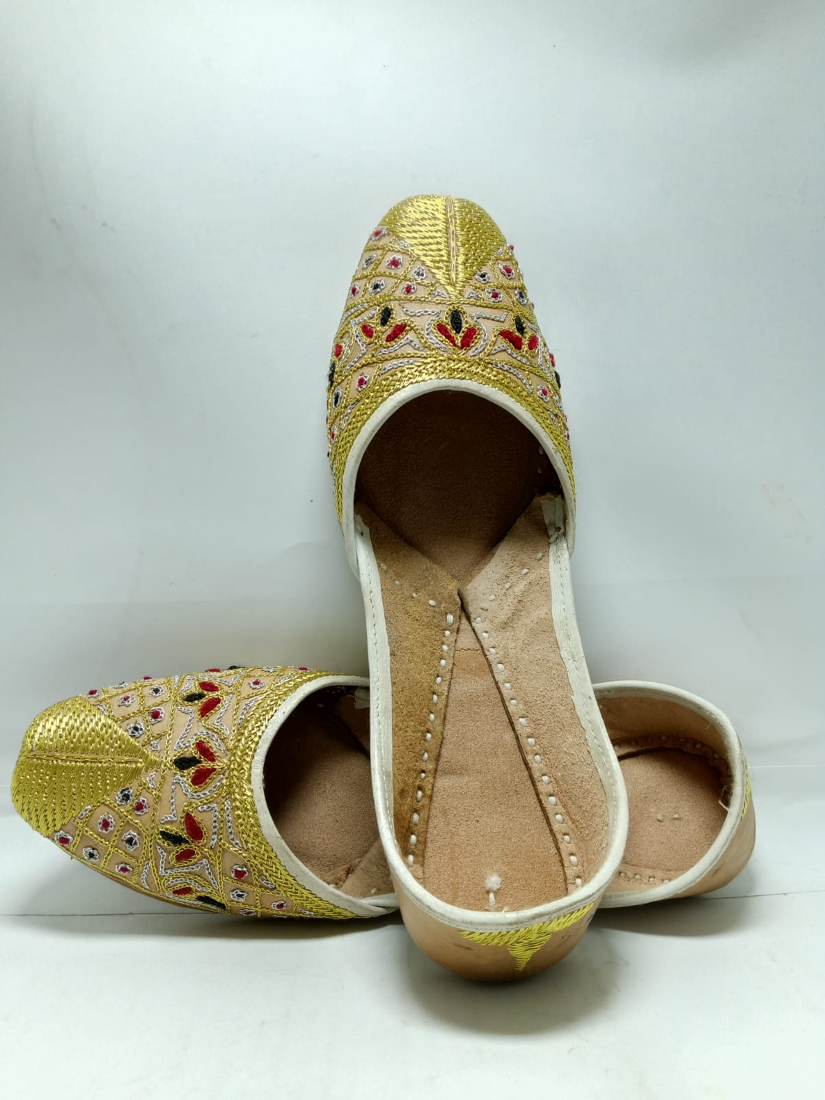 Jeniius "Golden jutti" Embroidered Khussa | Handcrafted Elegance with Gold, Red & Black Accents